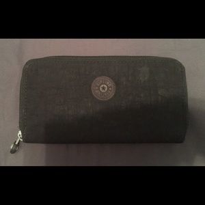 kipling uzario wallet